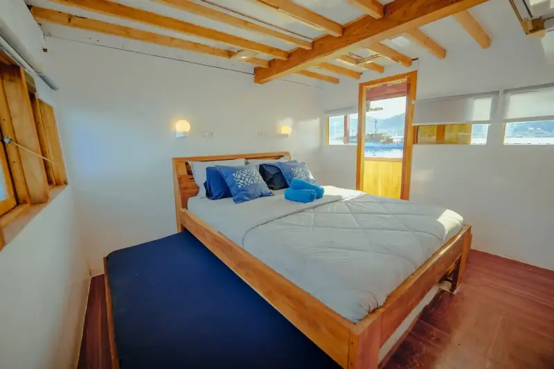 An ensuite cabin aboard a Deluxe class phinisi