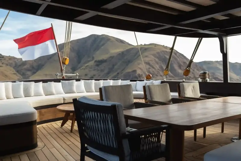 A table laid for dinner on the sundeck